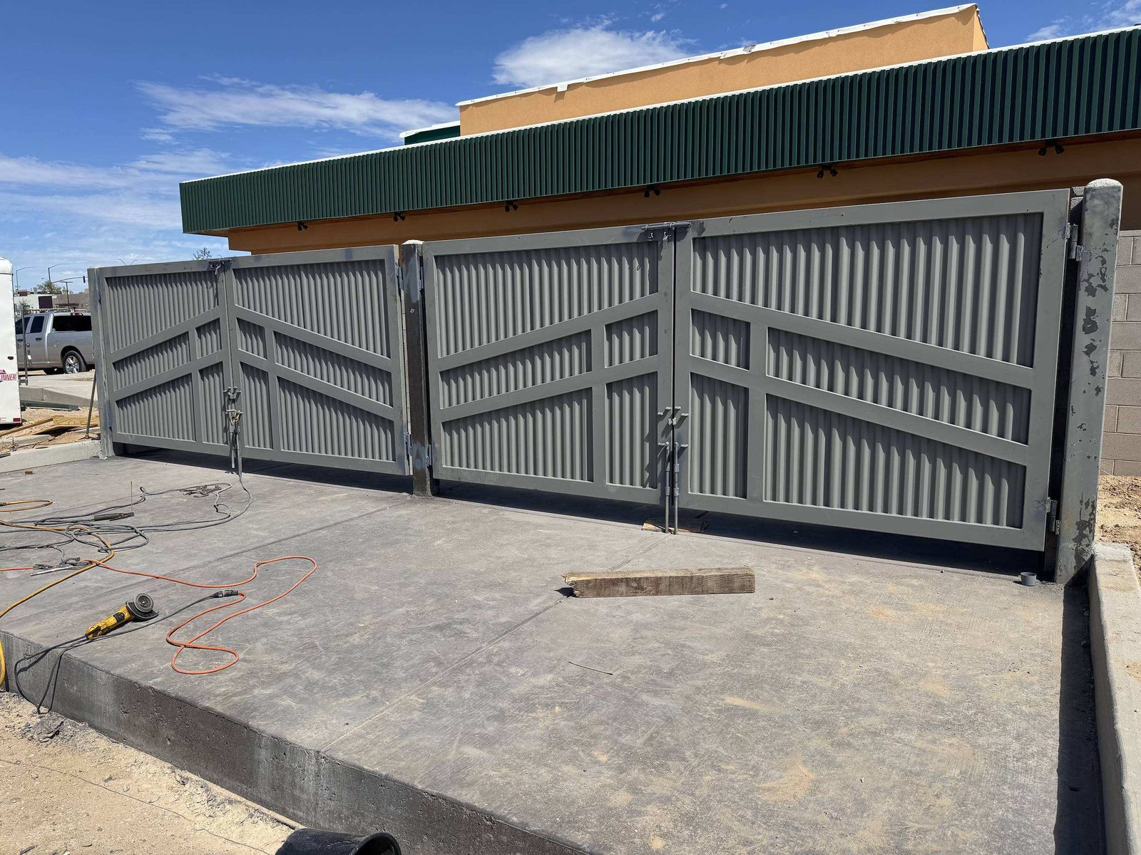 Braced steel enclosure gates