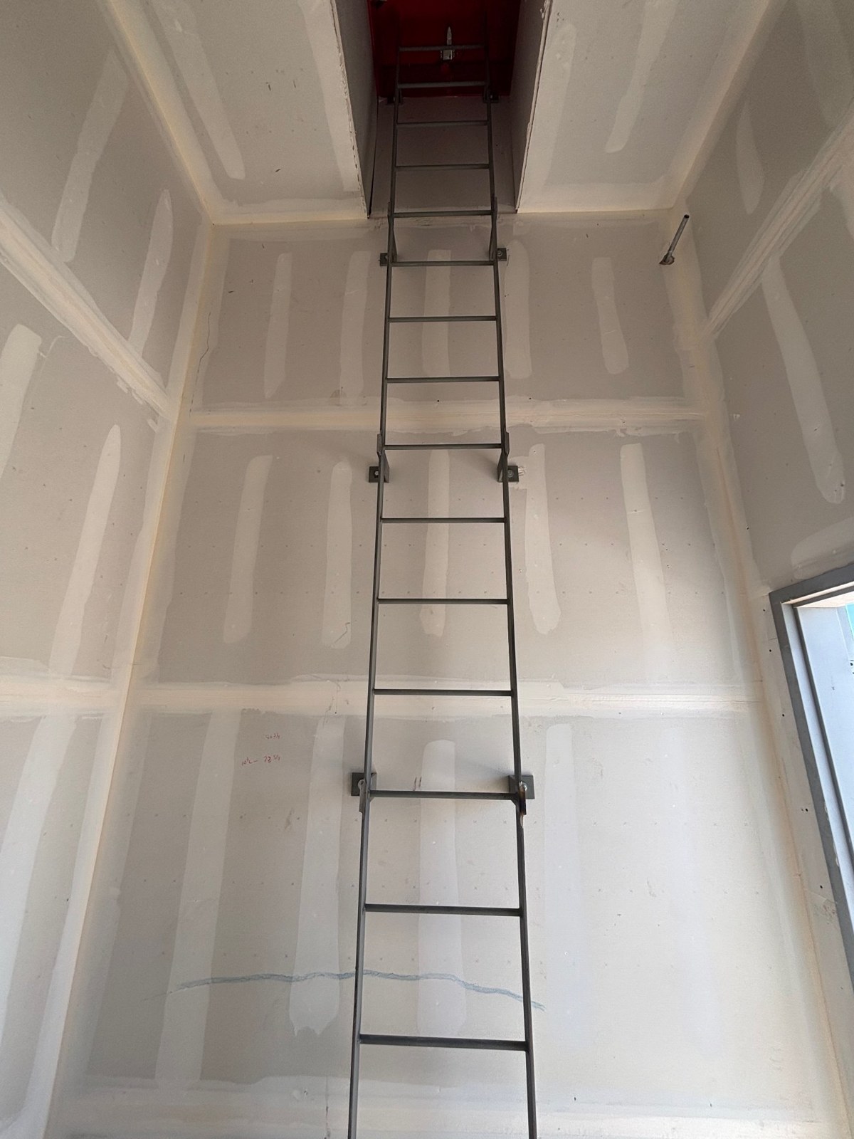 Roof hatch access ladder